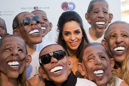 CANNES, FRANCE - MAY 17: actress Mallika Sherawat and a gaggle of Barack Obama's attends the "Politics Of Love" Cocktail Party at Nikki Beach la terracce on May 17, 2011 in Cannes, Franceのeditorial素材
