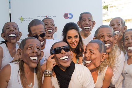 CANNES, FRANCE - MAY 17: actress Mallika Sherawat and a gaggle of Barack Obama's attends the "Politics Of Love" Cocktail Party at Nikki Beach la terracce on May 17, 2011 in Cannes, Franceのeditorial素材