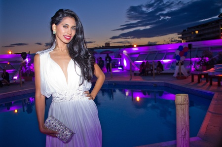 CANNES, FRANCE - MAY 17: British actress and designer  Fagun Thakrar (bag by Fagun Collection) attends the "Politics Of Love" Cocktail Party on May 17, 2011 in Cannes, Franceのeditorial素材