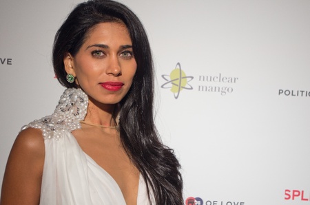 CANNES, FRANCE - MAY 17: British actress and designer  Fagun Thakrar (bag by Fagun Collection) attends the "Politics Of Love" Cocktail Party on May 17, 2011 in Cannes, Franceのeditorial素材