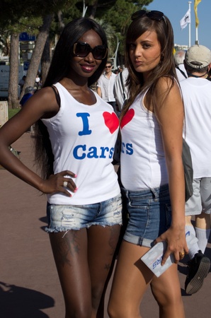 CANNES,FRANCE-MAY 20:  two beautiful and sexy hostess poses in the croisette during the festival of cinema on may 20th,2011 in Cannes, Franceのeditorial素材