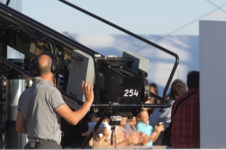 CANNES,FRANCE-MAY 20:  tv camera operator at work during the 64 cannes film festival on may 20th in Cannes, Franceのeditorial素材