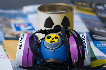 MAsk against nuclear radiaton is displayed during a protest against nuclear energy
