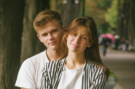 Romantic couple together in a park in autumnの写真素材