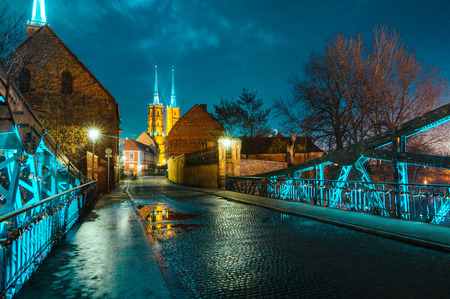 Wroclaw Cathedral seen through Tumski Bridge, Wroclaw's Saint Johns the Baptist Cathedral, Wroclaw, Polandの写真素材