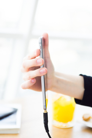 Young trendy woman doing selfies