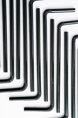 Abstrat background formed with multiple black straws. Texture theme.の写真素材