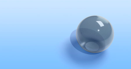 3d rendering of a glass sphere on a blue background with copy spaceの写真素材