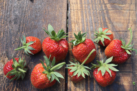 Strawberries on a wooden background. Fresh strawberries on a wooden background.の写真素材