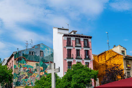 Colorful fruit mural one one house and a pink facade provide a colorful urban display in Madrid, Spainの写真素材