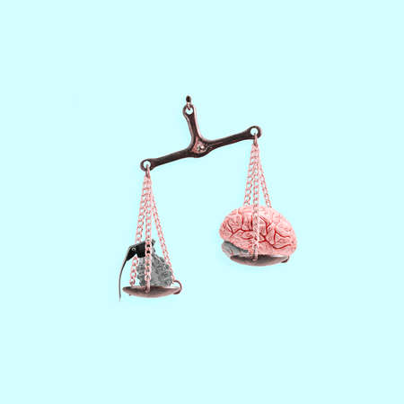 Scales of justice with a bomb and human brain on isolated pastel blue background. Minimal abstract creative anti-war concept. Reason against war, fear of dystopian future or worldwide destruction.の写真素材