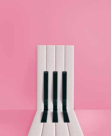 Minimal aesthetic composition of piano keys arranged in an abstract, rectangular shape on an isolated pastel pink background. Music creative card. Door or entrance concept.の写真素材
