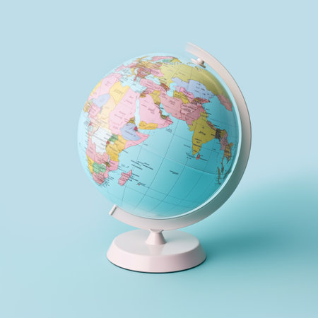 Globe on white stand isolated on pastel blue background. Graphic element. Minimal creative concept of travel, education, school, cartography, exploration, tourist destinations.の素材