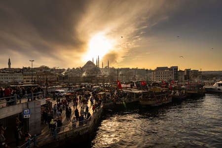 Istanbul, Turkey - March 7 2020: Sunset over the old city center of Istanbul, seen from the Galata Bridge.のeditorial素材