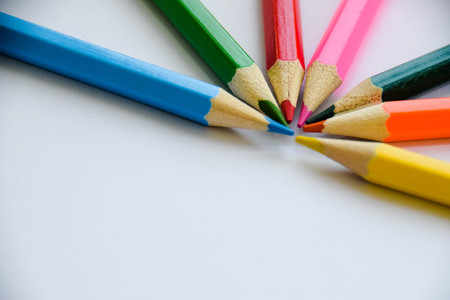 Multi-colored color pencils on white backgroundの写真素材