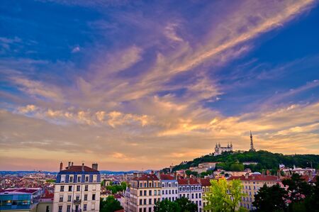 Lyon, France and the Basilica of Notre-Dame de FourviÃ¨re at sunset.の写真素材