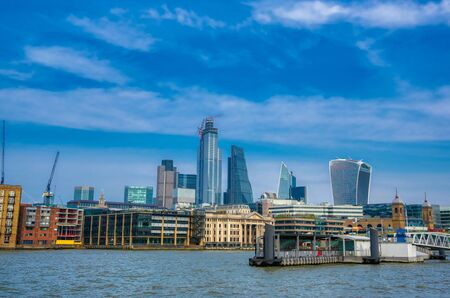 A view of the London skyline across the River Thames in London, UK.の写真素材
