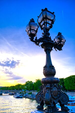 A view from the Pont Alexandre III bridge that spans the Seine River in Paris, Franceの写真素材
