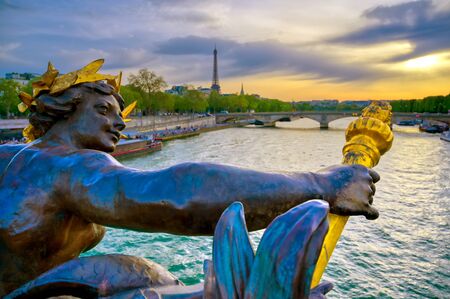 A view from the Pont Alexandre III bridge that spans the Seine River in Paris, Franceの写真素材