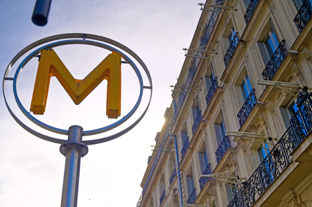 Paris, France - April 21, 2019 - A sign that marks the entrance to a metro station for the Paris underground subway system in France.のeditorial素材