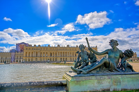 Versailles, France - April 24, 2019: The statues and fountains in and around the garden of Versailles Palace on a sunny day outside of Paris, France.のeditorial素材