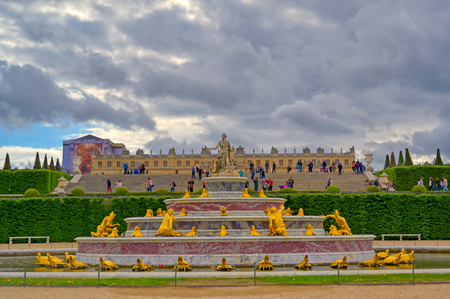 Versailles, France - April 24, 2019: Fountain of Latona in the garden of Versailles Palace on a sunny day outside of Paris, France.のeditorial素材