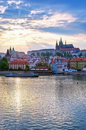 A view of Prague Castle across the Vltava River in Prague, Czech Republic.の写真素材