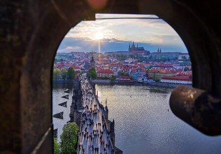 A view of Prague Castle and the Charles Bridge across the Vltava River in Prague, Czech Republic.の写真素材