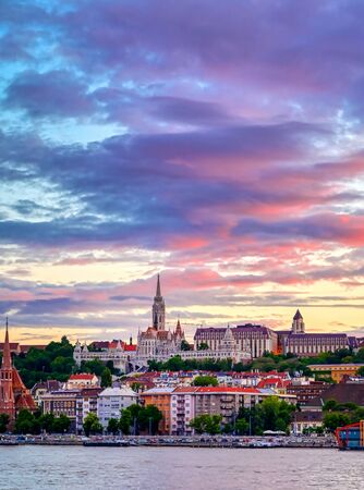 The Buda side of Budapest, Hungary along the Danube River at sunsetの写真素材