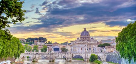 A view along the Tiber River towards St. Peter's Basilica and the Vatican in Rome, Italy.の写真素材