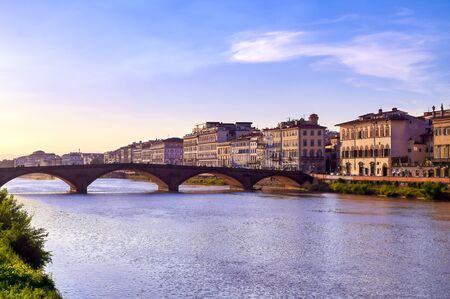 A view along the Arno River in Florence, Italy.の写真素材