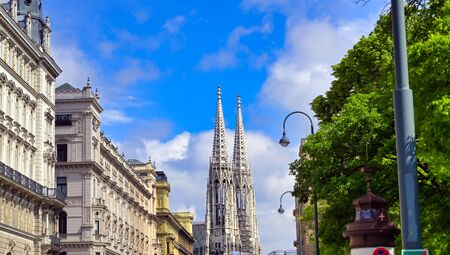 The Votivkirche, or Votive Church, from the streets of Vienna, Austria.の写真素材