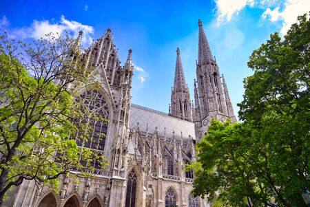 The Votivkirche, or Votive Church, from the streets of Vienna, Austria.の写真素材