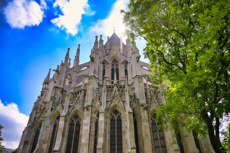 The Votivkirche, or Votive Church, from the streets of Vienna, Austria.の写真素材