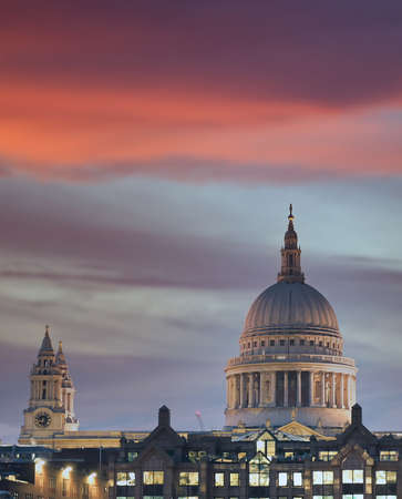 A view across the River Thames at dusk towards St. Paul's Cathedral in London, UK.の写真素材