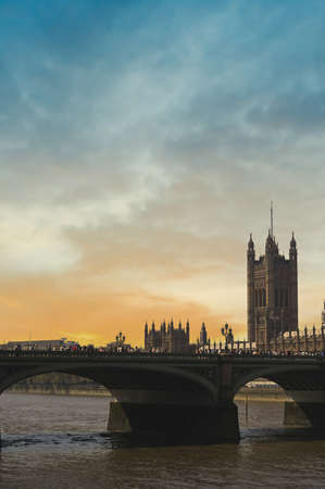 The Palace of Westminster along the banks of the Thames in central London, UK.