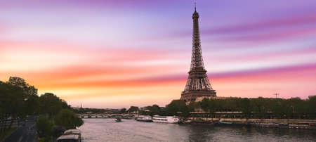 Sunset over the the Eiffel Tower and the Seine River in Paris, France.の写真素材
