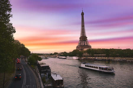 Sunset over the the Eiffel Tower and the Seine River in Paris, France.の写真素材