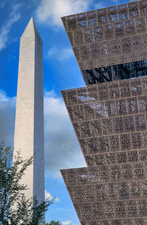Washington, D.C. - October 14th, 2021: The Smithsonian's National Museum of African American History and Culture on the National Mall with the Washington Monument.のeditorial素材