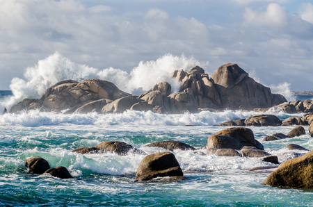 Impressive waves crashing on rocks coastline at San vicente de Grove, Galicia, Spain. Sunny dayの写真素材