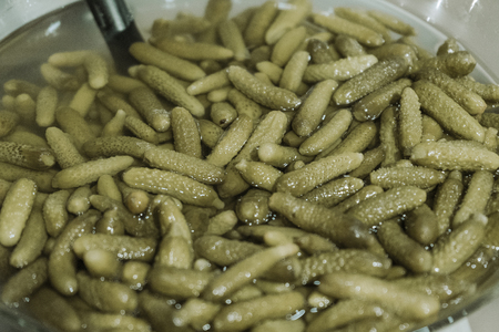 Bowl of pickled cucumbers in bulkの写真素材