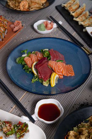 Assorted sashimi plate served on the restaurant table