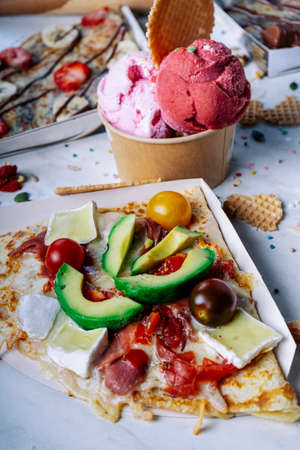 Sweet or savory crepes on the marble table