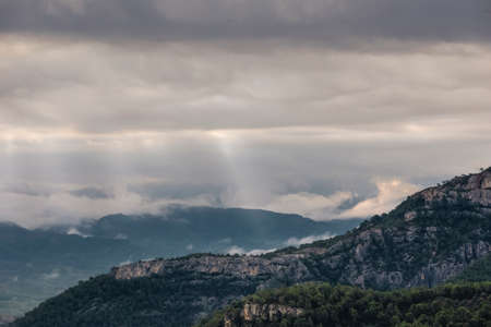 Scenic View Of Mountains Against Cloudy Skyの写真素材