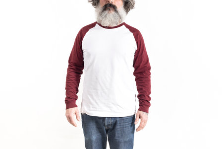 Handsome hipster male model with beard in baseball jersey with space for your logo or design in casual urban styleの写真素材