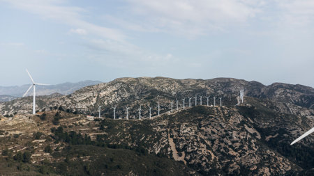 Aerial view of a wind farm. Wind turbine windmills. Green and sustainable energyの写真素材