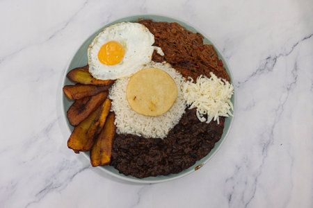 traditional Venezuelan dish called PabellÃ³n Criollo isolated on white backgroundの写真素材