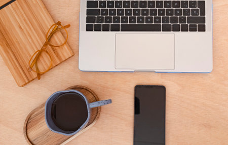 Flat lay, top view wooden office desk workspaceの写真素材