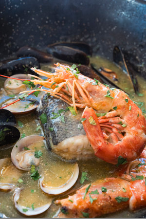View of fresh seafood pot with shrimp, mussels and various types of clams.の写真素材