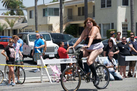 Funny man ridung bike during the Long Beach Lesbian and Gay Pride Parade 2012のeditorial素材